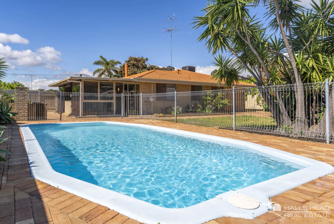 101 Boundary Road Dudley Park has an inviting pool surrounded by tropical plants