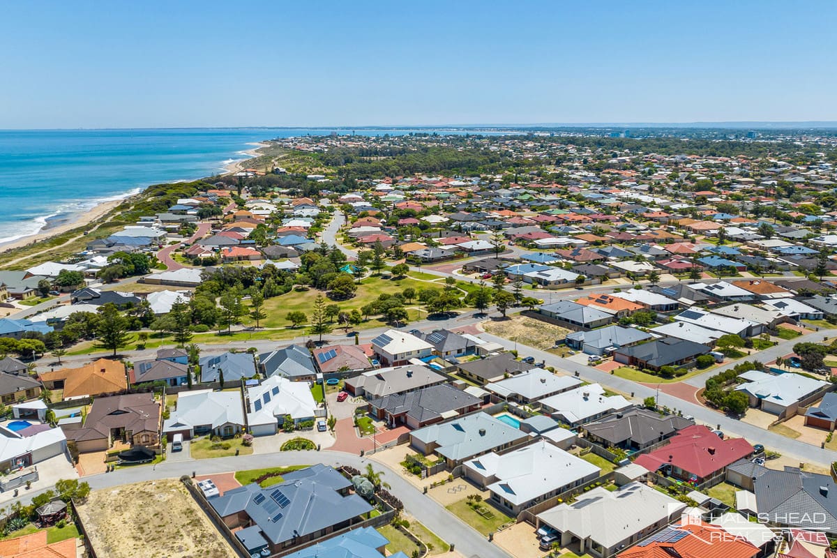 Coastal suburb with numerous houses.