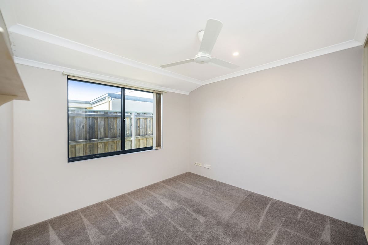 Empty room with carpet and window